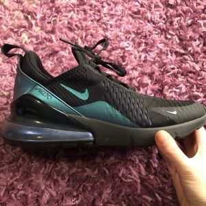 Women’s Nike shoes size 7.5.  Good condition. Hardly worn